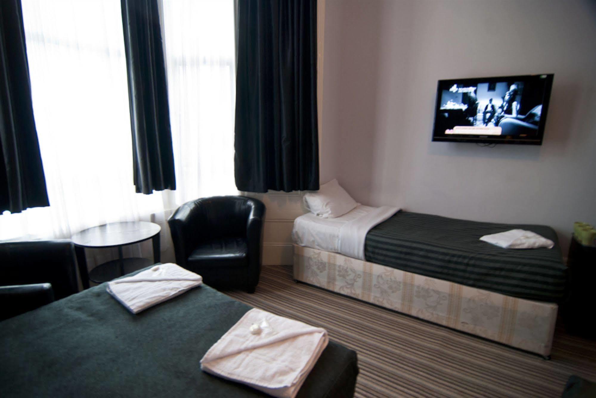 Comfotel Grn Londres Habitación foto